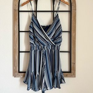 Ruffled smocked tie waste romper